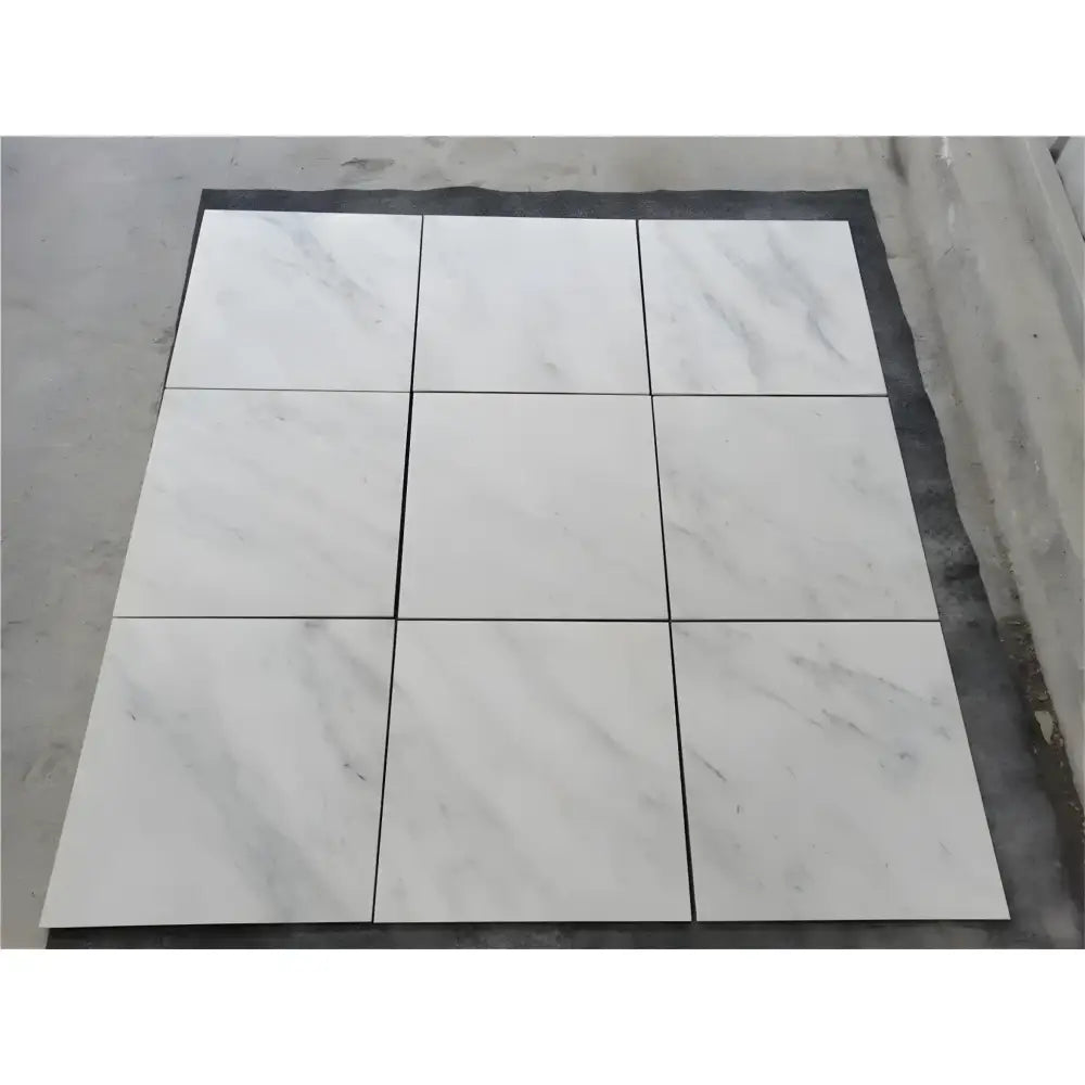 Nine white marble tiles from Oriental White Aurora Asian Statuary Marble 3X6