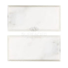 Two white marble tiles from Oriental White Aurora Asian Statuary Marble collection