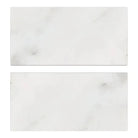 Two rectangular white marble tiles from Oriental White Aurora Asian Statuary Marble 3X6 Tumbled