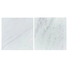 Two polished and honed Oriental White Aurora marble tiles with deep-beveled edges