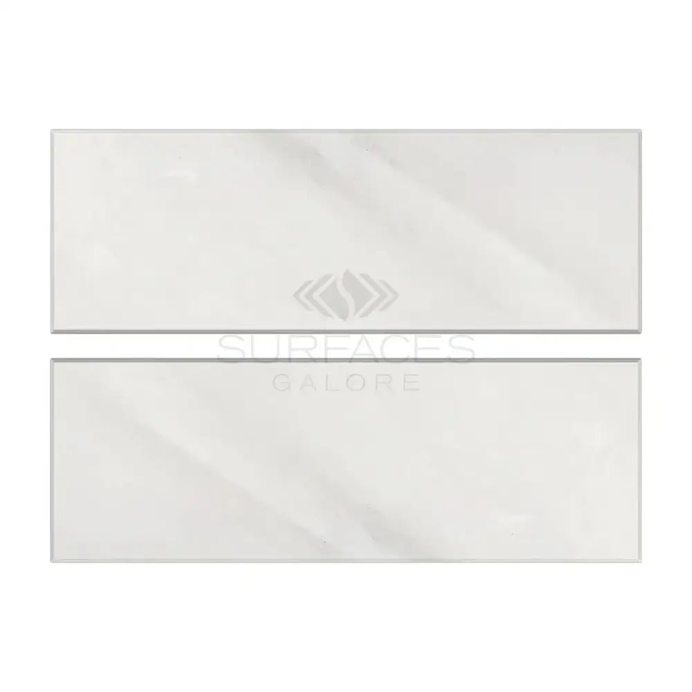 Two rectangular white marble tiles from Oriental White Aurora Asian Statuary Marble