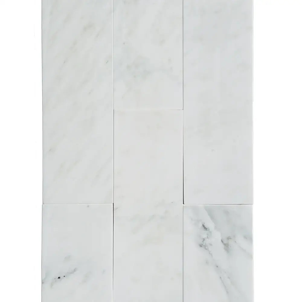 White marble tile arrangement of Oriental White Aurora Asian Statuary Marble 4x12