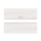Two white rectangular tiles from Oriental White Aurora Asian Statuary Marble collection