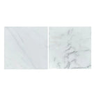 Two white marble tiles from Oriental White Aurora Statuary Marble for flooring or walls