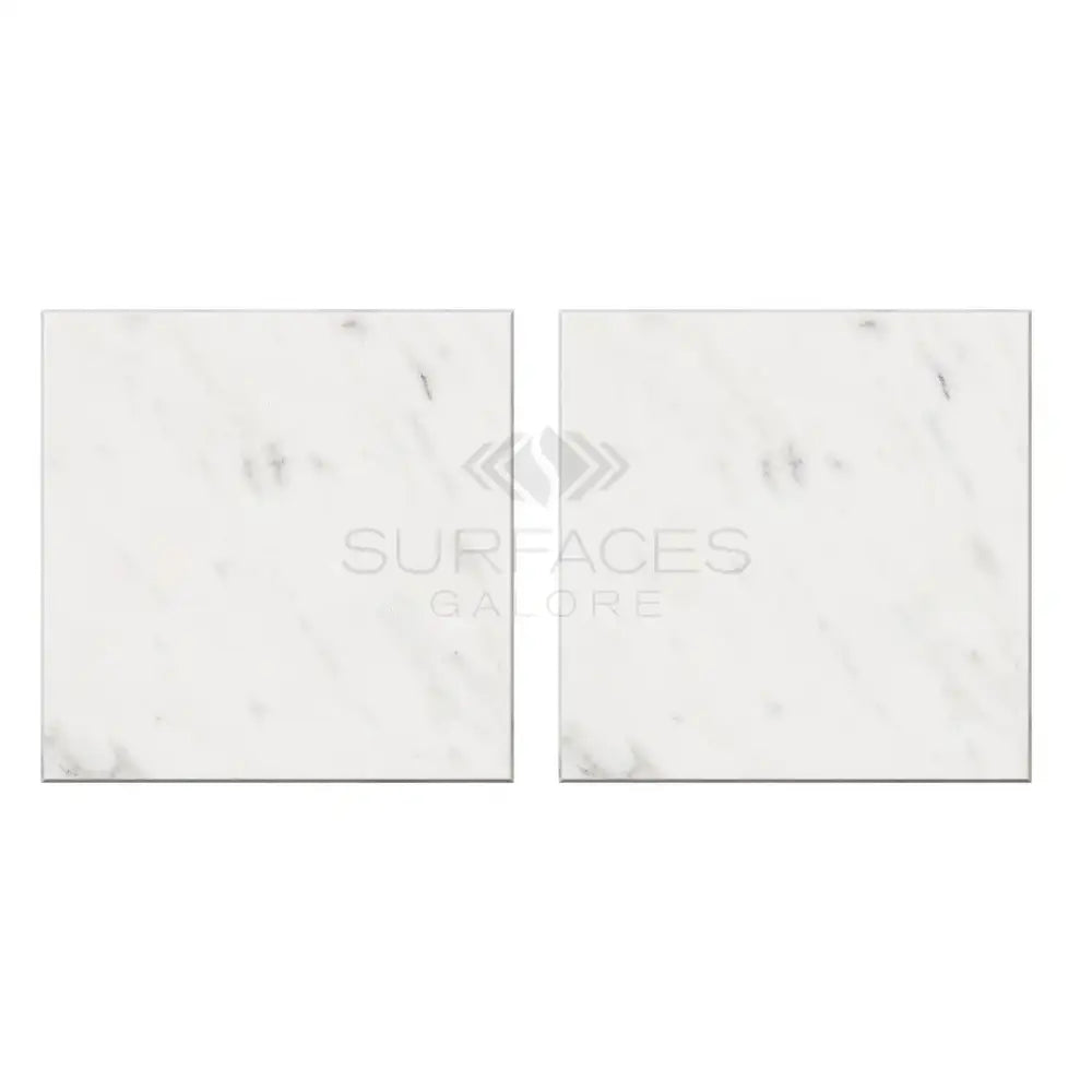 Two square Oriental White Aurora Asian Statuary Marble tiles in polished finish
