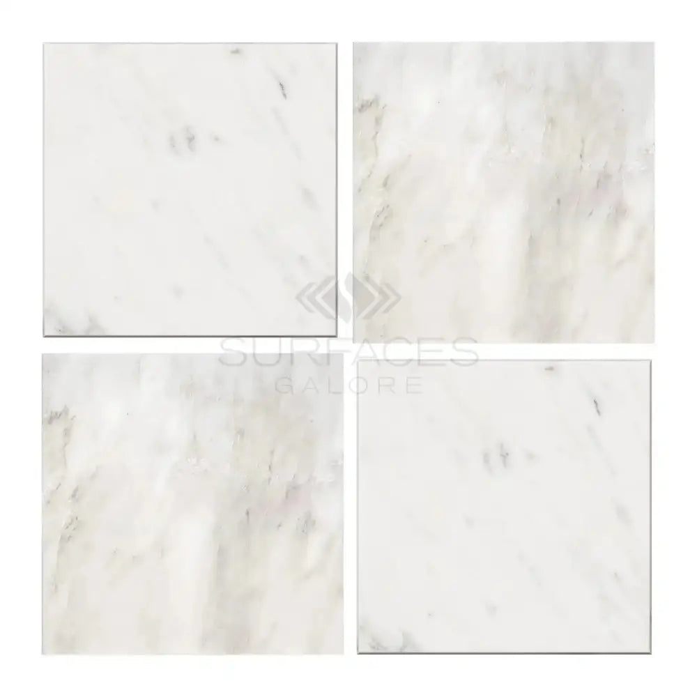 Four polished or honed Oriental White Aurora marble tiles for elegant flooring or wall decor
