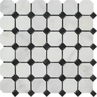 Octagon and diamond mosaic tile pattern in Oriental White Aurora with Black Marble accents