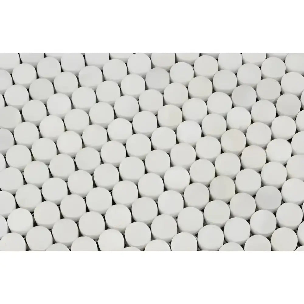 White cylindrical pills arranged in an array for Oriental White Aurora Marble Mosaic