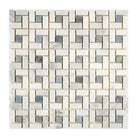 Mosaic tile pattern from Oriental White Aurora with blue-gray marble accents