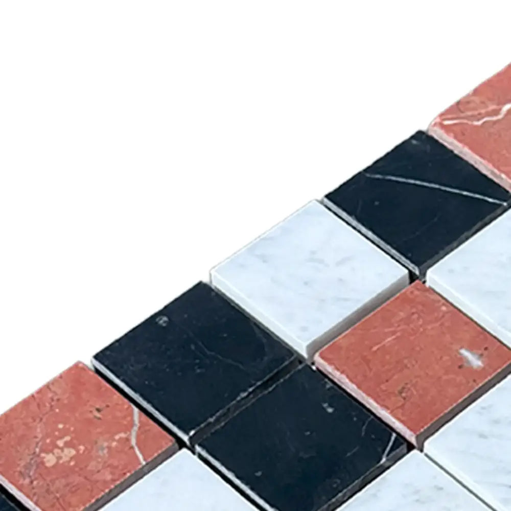 Checkerboard pattern of Rojo Alicante Select, Carrara White Royale, and Nero Marquina marble tiles