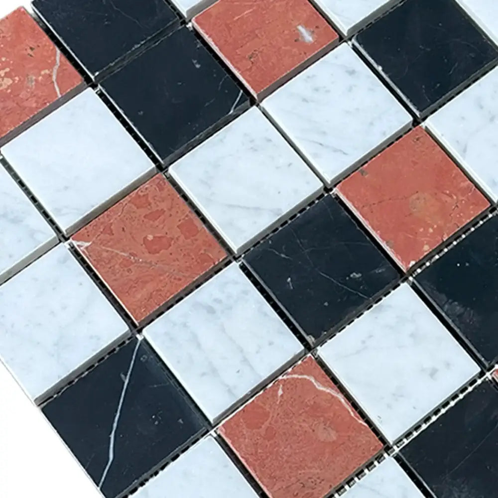Checkerboard mosaic tile pattern featuring Rojo Alicante, Carrara White, and Nero Marquina
