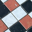 Checkerboard mosaic tile pattern in Rojo Alicante, Carrara White, Royale White, and Nero Marquina