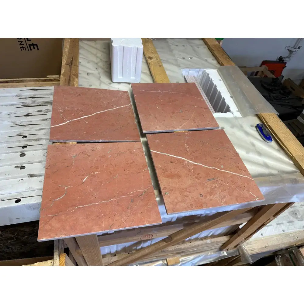 Red marble tiles with white veining from Rojo Alicante Select Marble 12X12 Honed-Polished