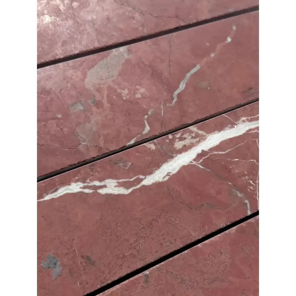 Red marble tiles with white veining in Rojo Alicante Select Marble 3x12 Field Tile