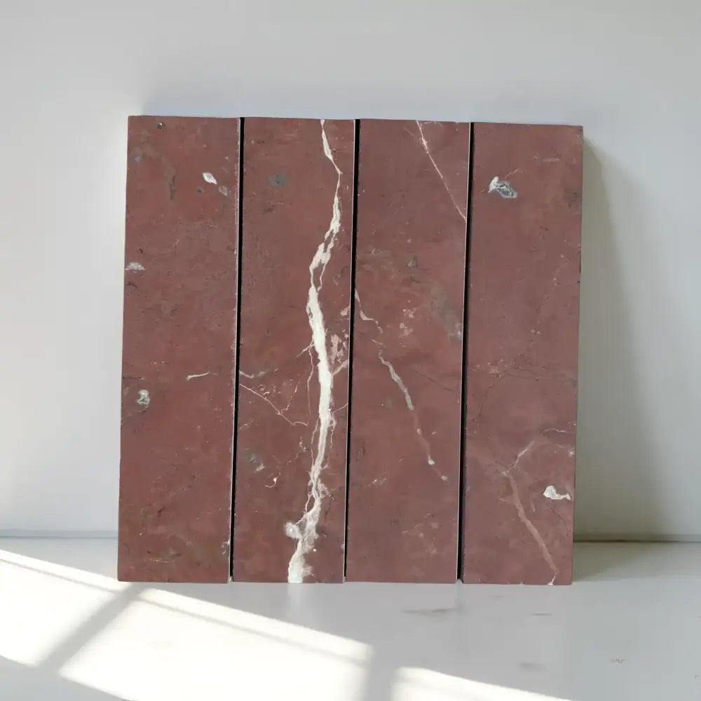 Red marble tiles with white veining from Rojo Alicante Select Marble 3x12 Field Tile