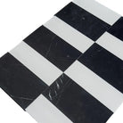 Black and white herringbone tile pattern from Siena in Bianco Dolomite and Nero Marquina set