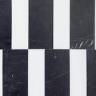 Black and white striped marble tiles from Siena in Dolomite Prestige and Nero Marquina set