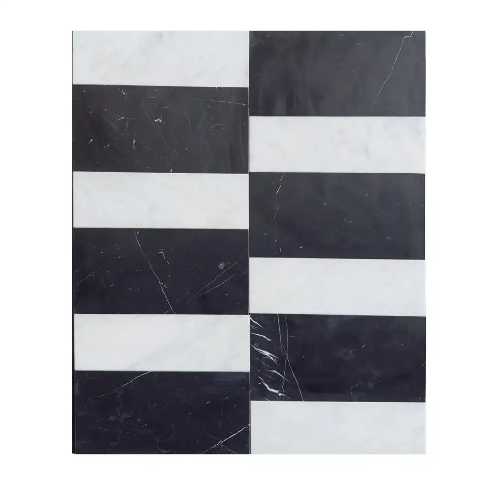 Black and white striped marble tiles from Siena in Carrara White Royale and Nero Marquina