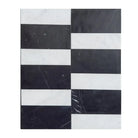 Black and white striped marble tiles from Siena in Carrara White Royale and Nero Marquina