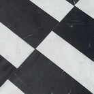 Black and white marble tile pattern from Siena Carrara White Royale and Nero Marquina Prestige set