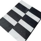 Black and white checkered marble tiles in Siena Carrara White Royale and Nero Marquina set