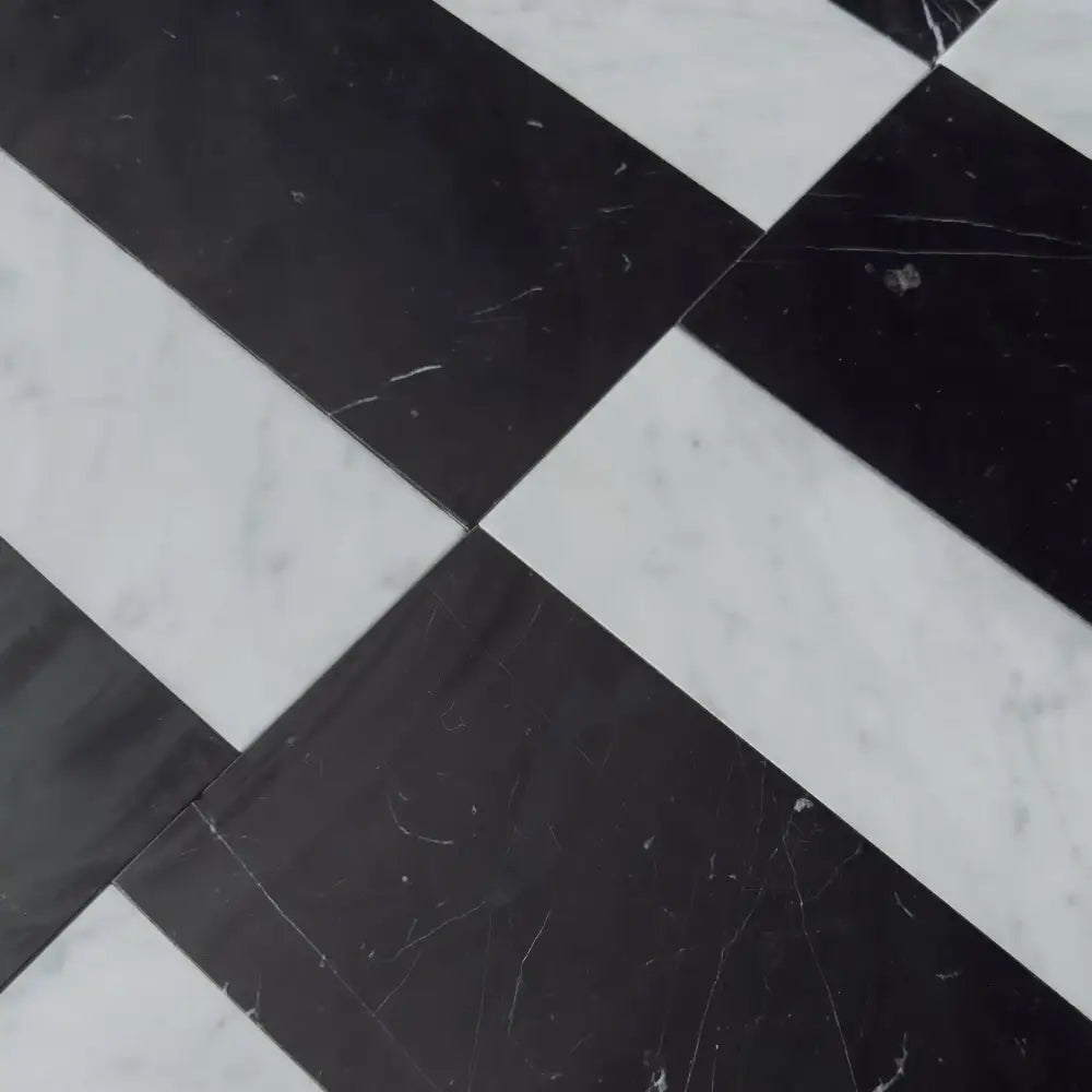 Black and white checkered marble floor from Siena in Carrara White Royale and Nero Marquina