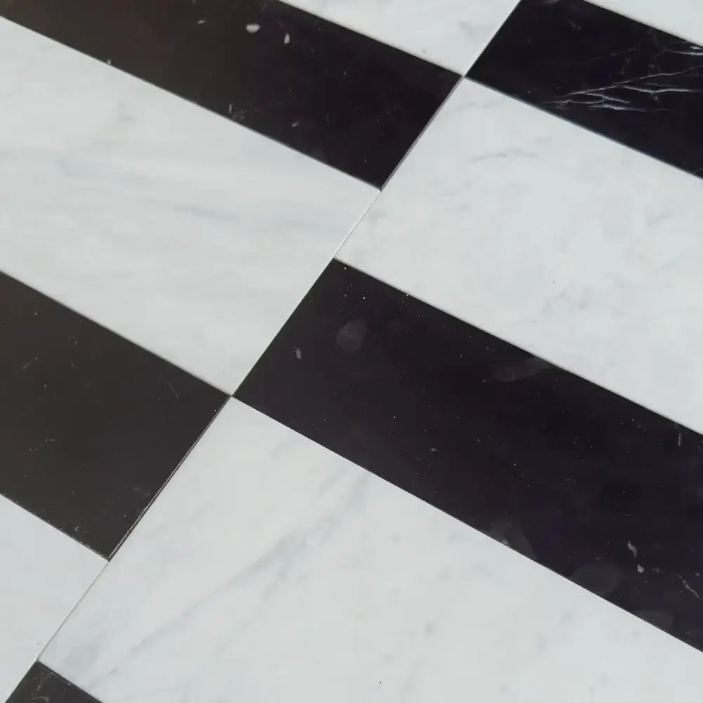 Black and white checkered floor tiles from Siena Carrara White Royale and Nero Marquina Prestige set