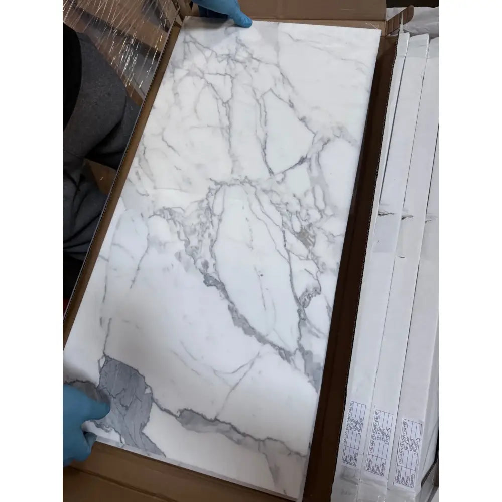 Marble-patterned ceramic tile from Statuary Statuario White 12x12 Italian Marble collection