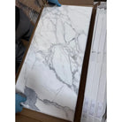 Marble-patterned ceramic tile from Statuary Statuario White 12x12 Italian Marble collection