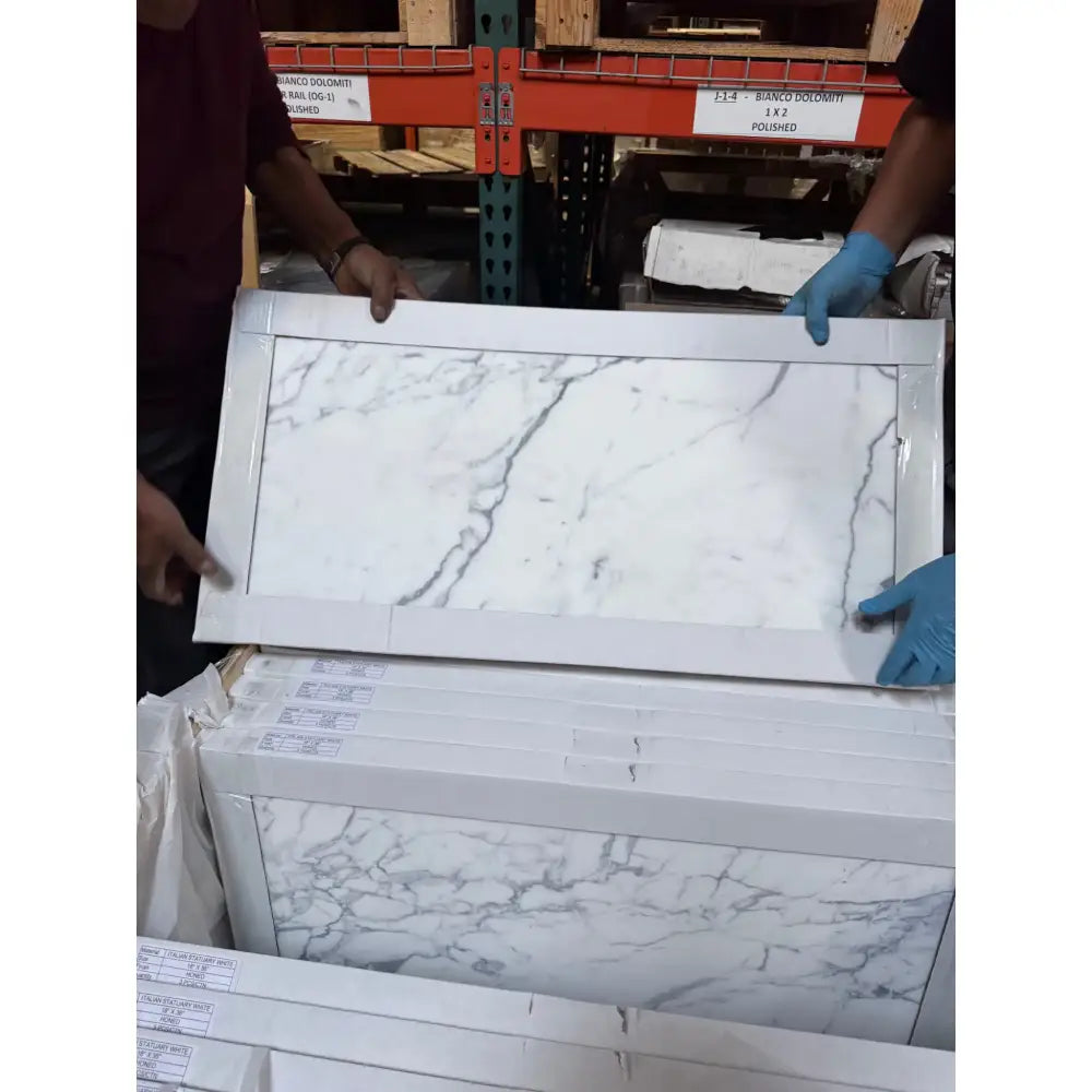 Marble-patterned rectangular tiles from Statuary Statuario White 12X12 Italian Marble