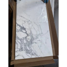 Marble-patterned white tile in cardboard packaging for Statuary Statuario White 12x12 Italian Marble