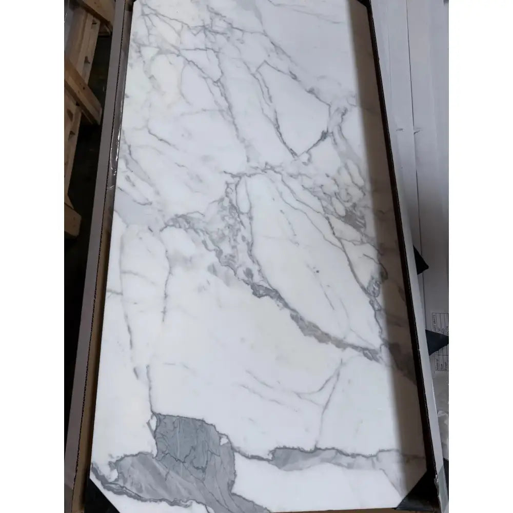 White marble slab with elegant gray veining from Statuary Statuario White 12X12 Italian Marble
