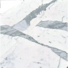 White marble surface with gray veining from Statuary Statuario White 12x24 Italian Marble