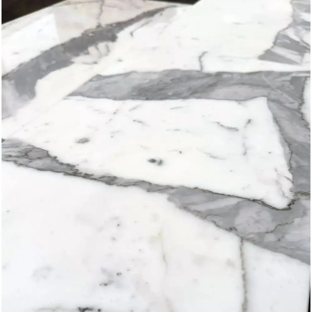 White and gray marble surface of Statuary Statuario White 12X24 Italian Marble