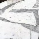 White and gray marble surface of Statuary Statuario White 12X24 Italian Marble