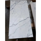 White marble-patterned tile from Statuary Statuario White 18X18 Italian Marble collection