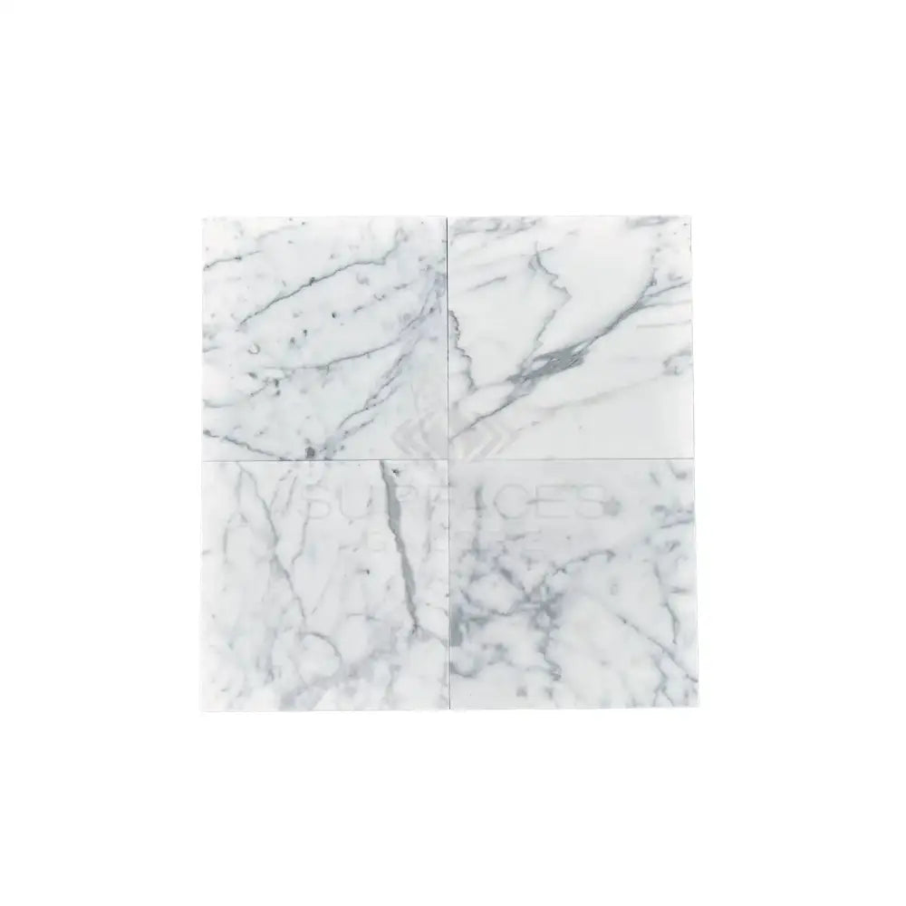 Four Statuario White 24x24 Italian marble tiles shown in polished or honed finish