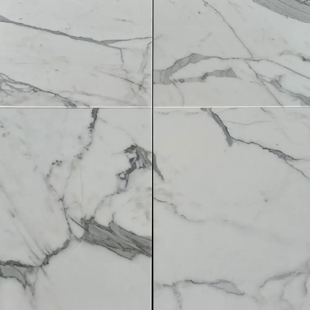 Marble-patterned ceramic tiles in Statuary Statuario White 4X12 for elegant flooring