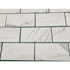 White marble-patterned tiles from Statuary Statuario White 4X12 Italian Marble