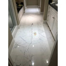 White marble floor with gray veining from Statuary Statuario White 4X12 Italian Marble