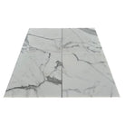 Four marble-patterned tiles from Statuary Statuario White 4X12 Italian Marble collection