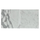 Two polished Statuary White Italian marble tiles showcasing elegant veining