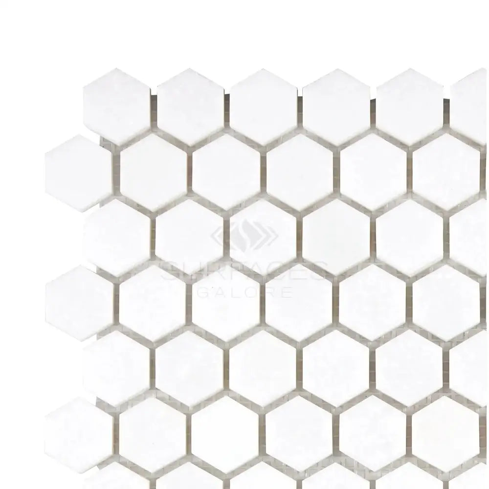 White hexagonal tile mosaic from Thassos Supreme 1 Inch Hexagon Marble collection
