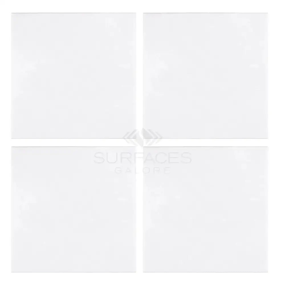Four white square Thassos Supreme 18X18 marble tiles polished or honed