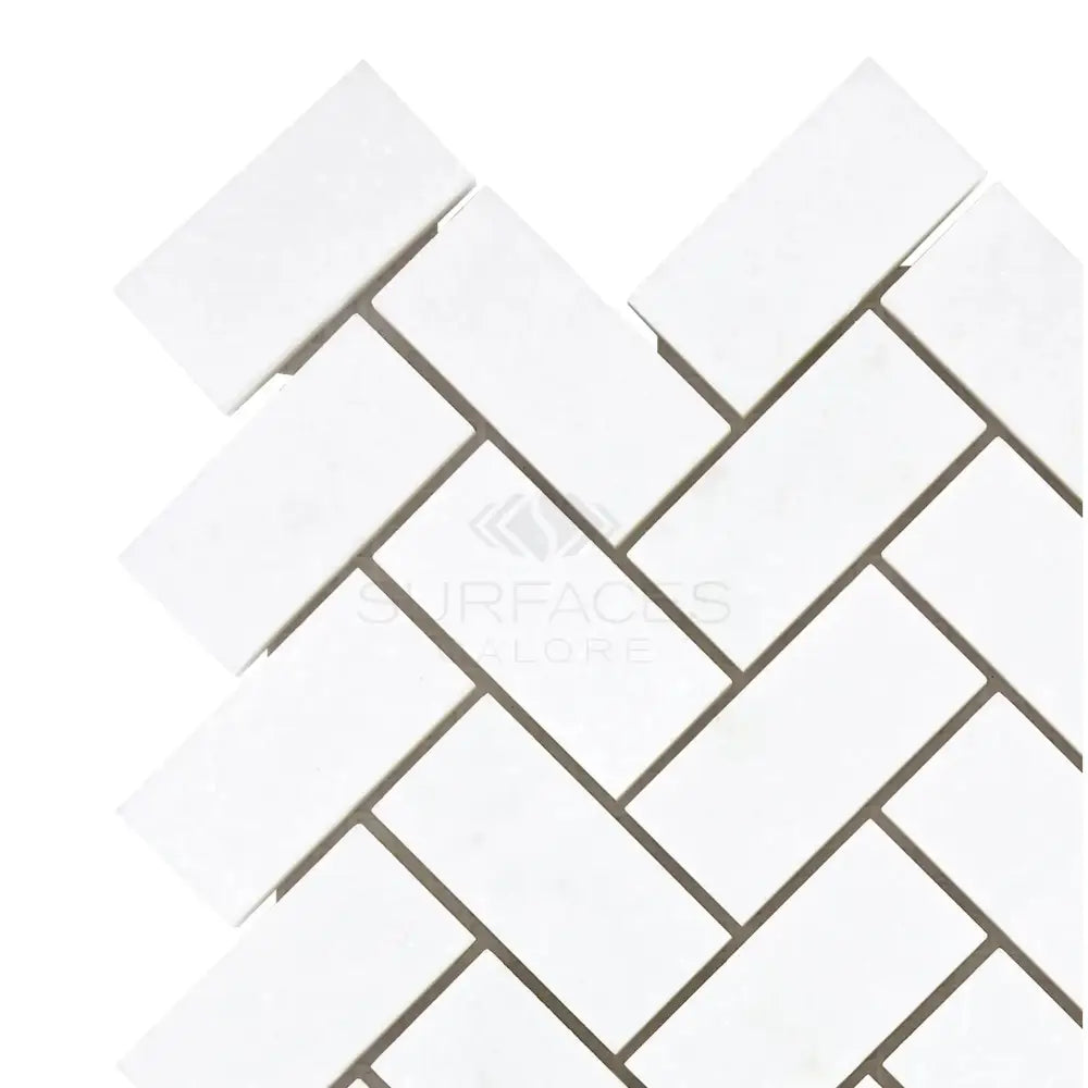 White herringbone tile pattern on Thassos Supreme 1X2 Herringbone Mosaic Marble