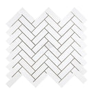 White herringbone tile pattern from Thassos Supreme 1X3 Herringbone Mosaic Marble