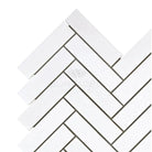 White herringbone tile pattern in Thassos Supreme 1X4 Herringbone Mosaic Marble