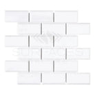White subway tile pattern on Thassos Supreme 2x4 Deep-Beveled Brick Mosaic Marble