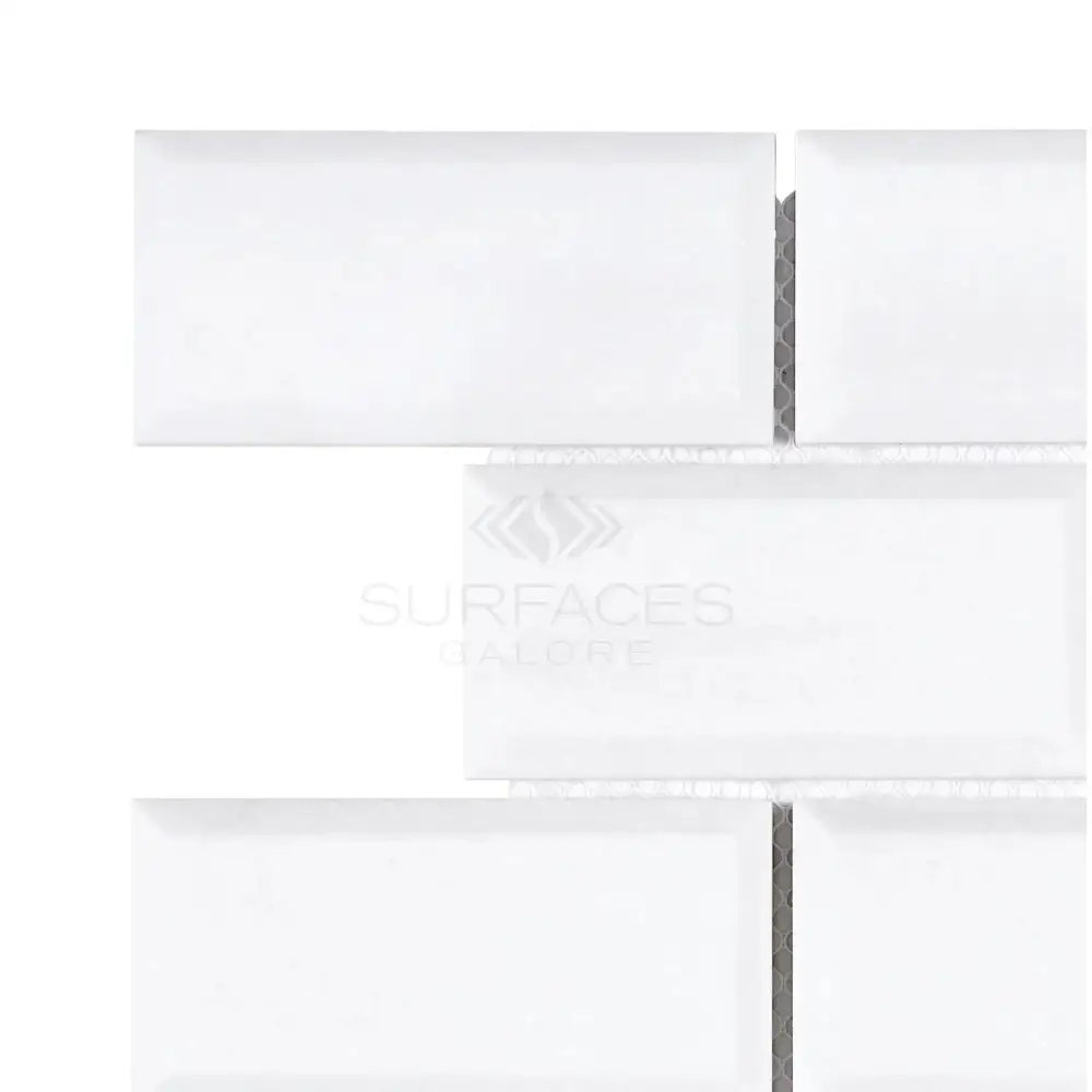 White beveled subway tile from Thassos Supreme 2X4 Deep-Beveled Brick Mosaic Marble