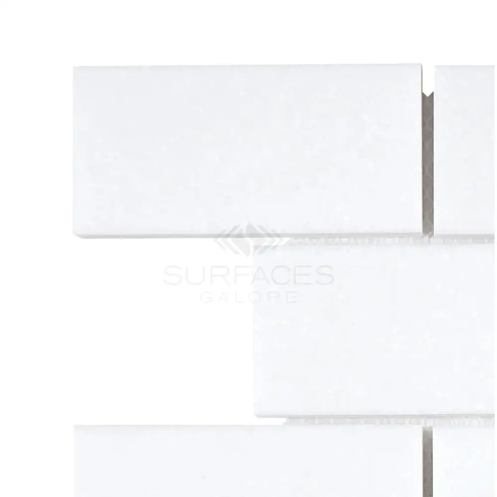 White rectangular tile pattern from Thassos Supreme 2X4 Brick Mosaic Marble